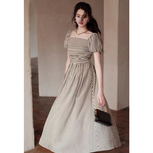 Meizi's same style [slightly drunken lines] black and white striped suspender dress design holiday style puff sleeve long skirt