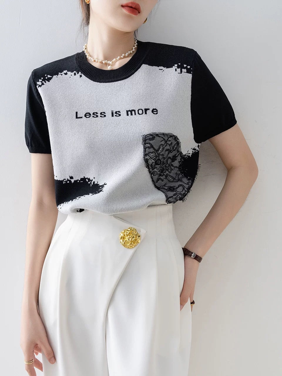 French black and white jacquard short-sleeved knitted t-shirt short-sleeved women's clothing 2025 summer new loose unique and chic tops