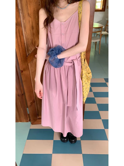 RAINY – A soft, lively, and youthful V-neck camisole dress; a loose-fitting, solid-color midi dress with a waist belt, perfect for summer.