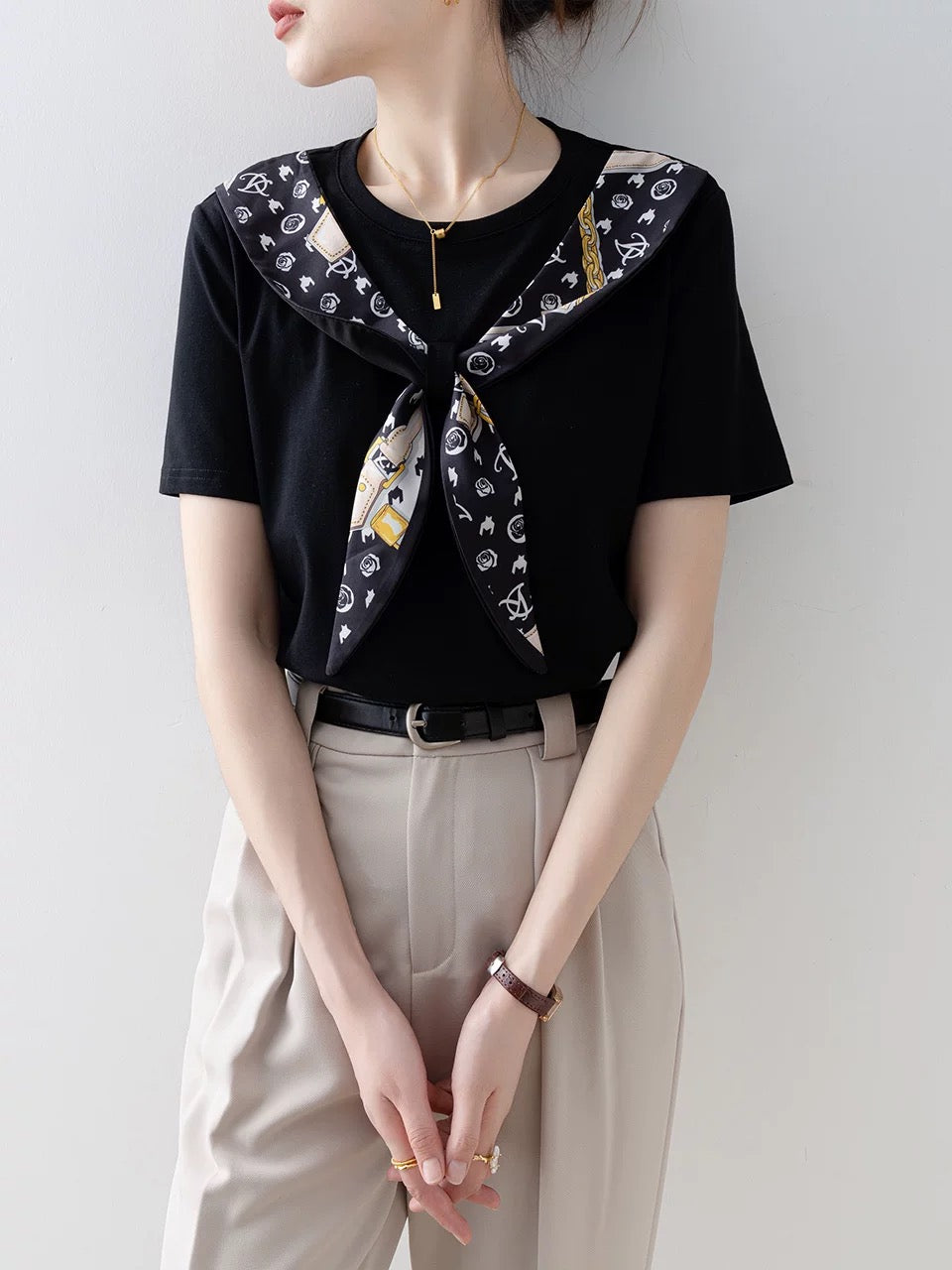 Black round neck short-sleeved T-shirt for women summer 2025 new high-end European goods fake two-piece stitching unique super good-looking top