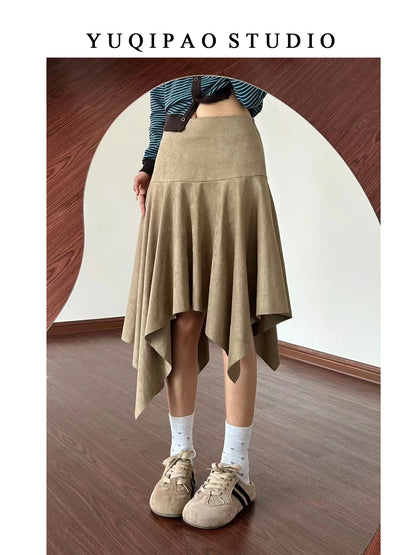 Plus-size suede midi skirt for women, winter style, A-line, umbrella skirt, mid-length, irregular design.