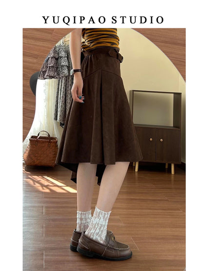 Plus-size suede midi skirt in brown for autumn and winter, A-line style, irregular length.