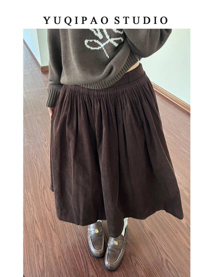 Plus-size corduroy retro brown midi skirt, elastic waist, A-line, slightly chubby, mid-length umbrella skirt, perfect for autumn and winter.