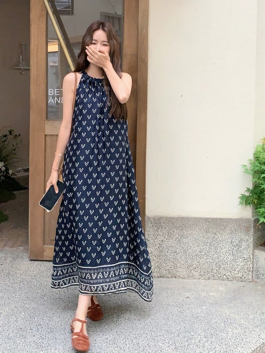 South France retro print navy blue halter neck suspender dress female 2025 summer vacation elegant temperament off-shoulder long dress