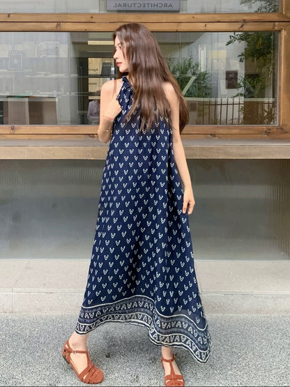 South France retro print navy blue halter neck suspender dress female 2025 summer vacation elegant temperament off-shoulder long dress