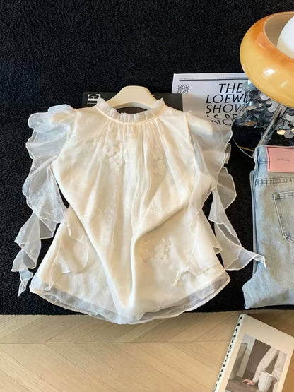 Guangzhou Shisanhang Women's Fashion – Short-Sleeve Chiffon Blouse with a Stylish Stand Collar – Soft Summer Top with Asymmetrical Ruffles