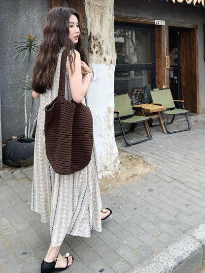 Retro age-reducing ethnic style printed sleeveless dress for women 2025 summer Yunnan vacation tourism atmosphere long dress