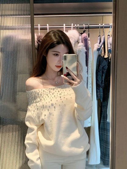 Off-the-shoulder white moonlight rhinestone long-sleeved knit sweater for women, autumn and winter, exquisite and high-end, pure and sexy loose top.