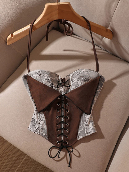 Sexy and sophisticated lace-up camisole top, slimming and flattering, perfect for wearing alone. Unique design.