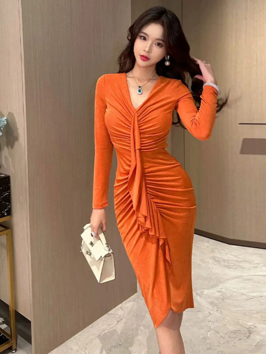 European station sexy V-neck dress autumn and winter new dress super nice French temperament slimming slim hip skirt