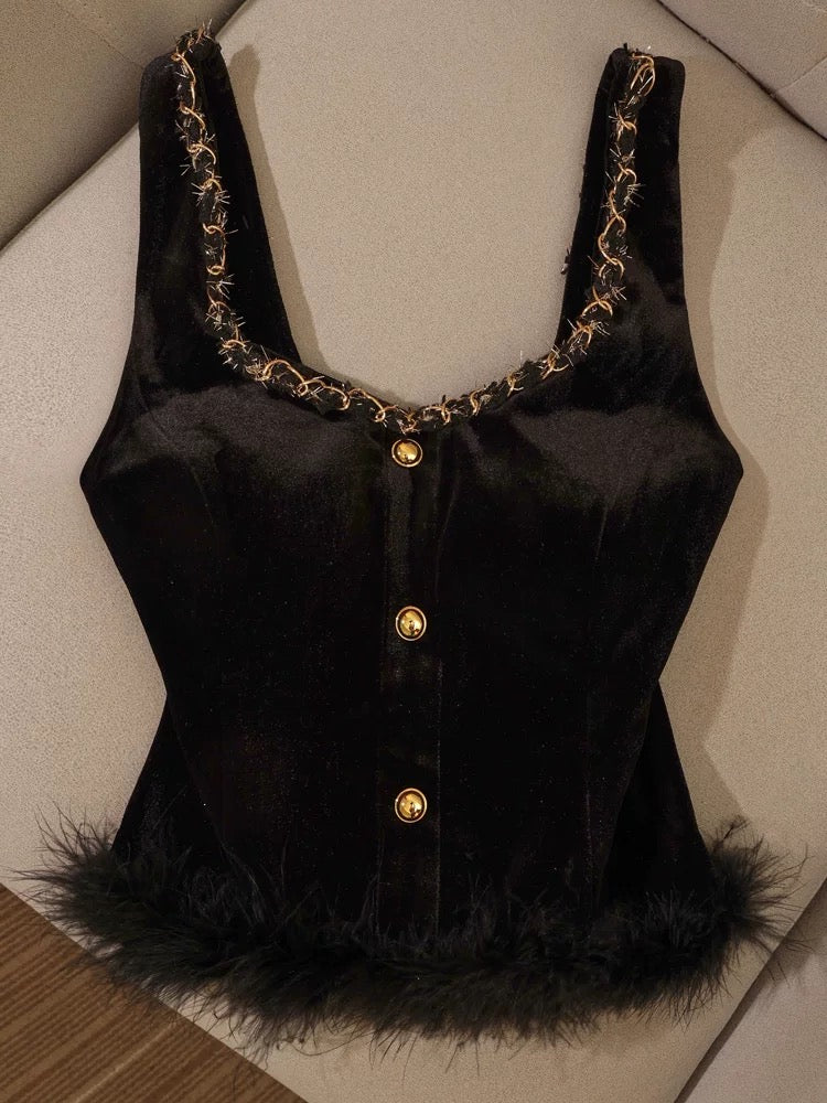 Black velvet and fur-trimmed camisole, versatile, elegant, and sophisticated, perfect for layering or wearing on its own.