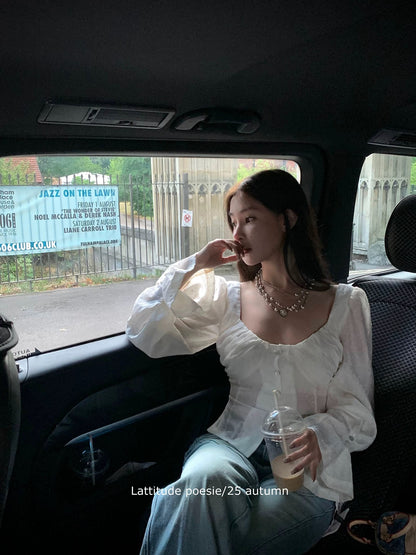 Lattitude/Yang Xiaolu - Autumn-inspired, subtly sheer, slimming multi-panel design with flared sleeves for a flattering silhouette.