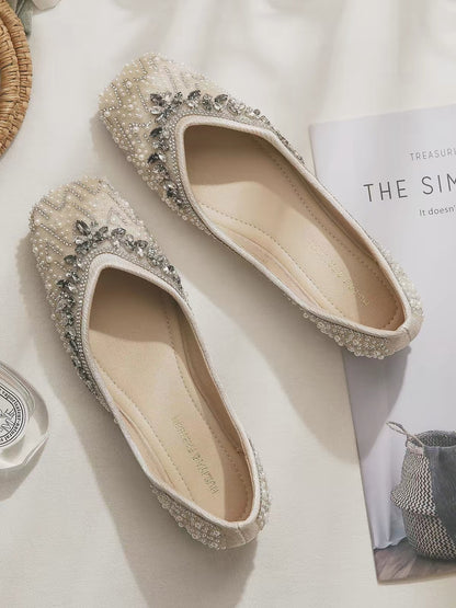 Stunning French-style rhinestone flats—chic, comfortable, and perfect for pairing with dresses. Featuring a low-cut, square-toe design; a gorgeous new style for Summer 2026.
