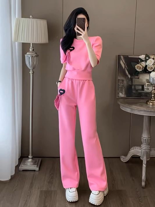 Pink internet celebrity sports and leisure suit for women, summer fashion, slim and beautiful, fashionable street short-sleeved wide-leg pants two-piece set