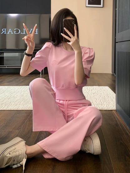 Pink sports and leisure suit for women summer 2024 new fashion age-reducing internet celebrity short-sleeved wide-leg pants two-piece set with western style