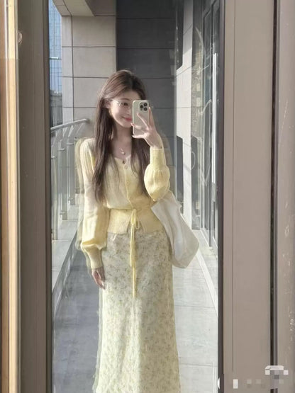 Korean style early autumn gentle style yellow knitted cardigan floral skirt suit female high-end temperament a complete set of wear