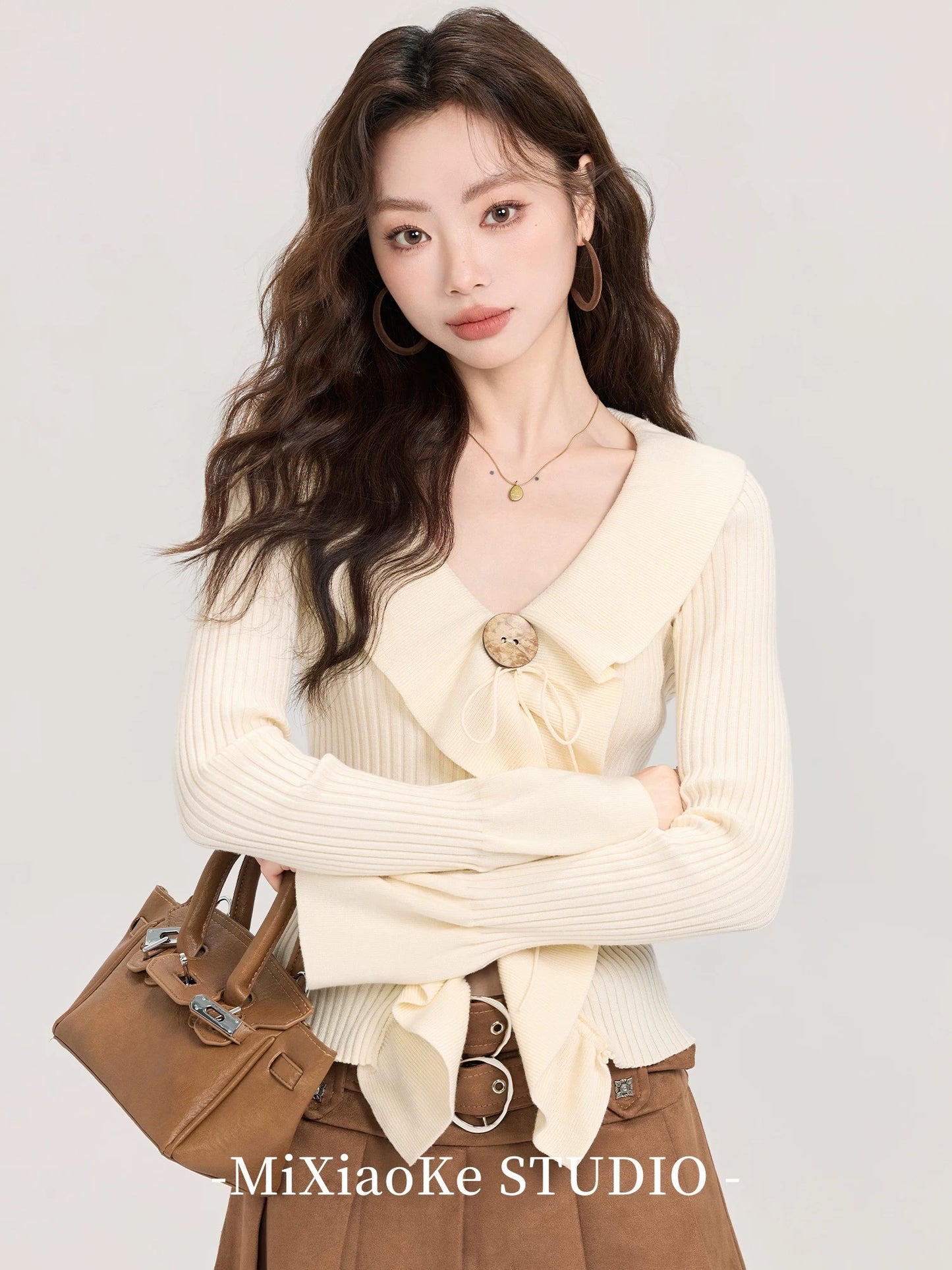 Mi Xiaoke French sweet ruffled V-neck sweater for women autumn and winter 2025 new irregular long-sleeved top