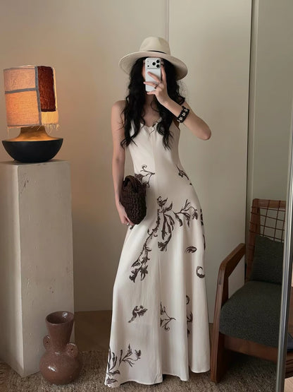 New Arrival: French-style elegant Tencel printed camisole dress with a waist-cinching design.