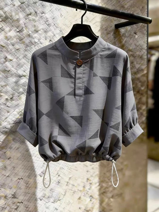 High-end casual women's grey shirt featuring a stylish geometric pattern—a standout design from the Summer 2026 collection.
