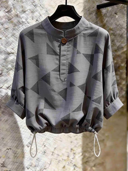 High-end casual women's grey shirt featuring a stylish geometric pattern—a standout design from the Summer 2026 collection.