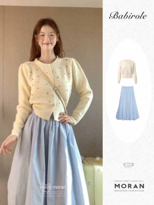 Korean style early autumn temperament outfit a complete set of round neck sweater jacket knitted cardigan half skirt two-piece suit for women