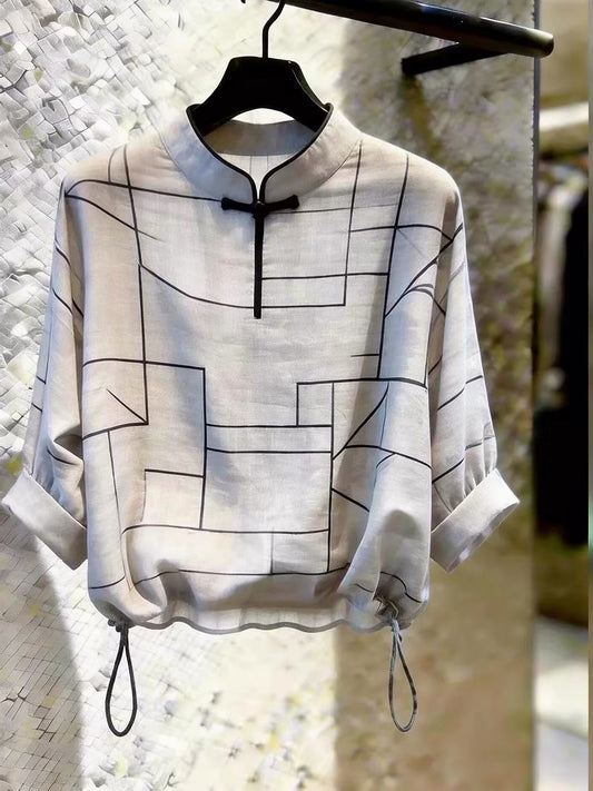 Store-exclusive item: 2026 Summer new arrival—a Korean-style, loose-fitting, versatile striped top with a stand collar; soft, elegant, and premium in quality.