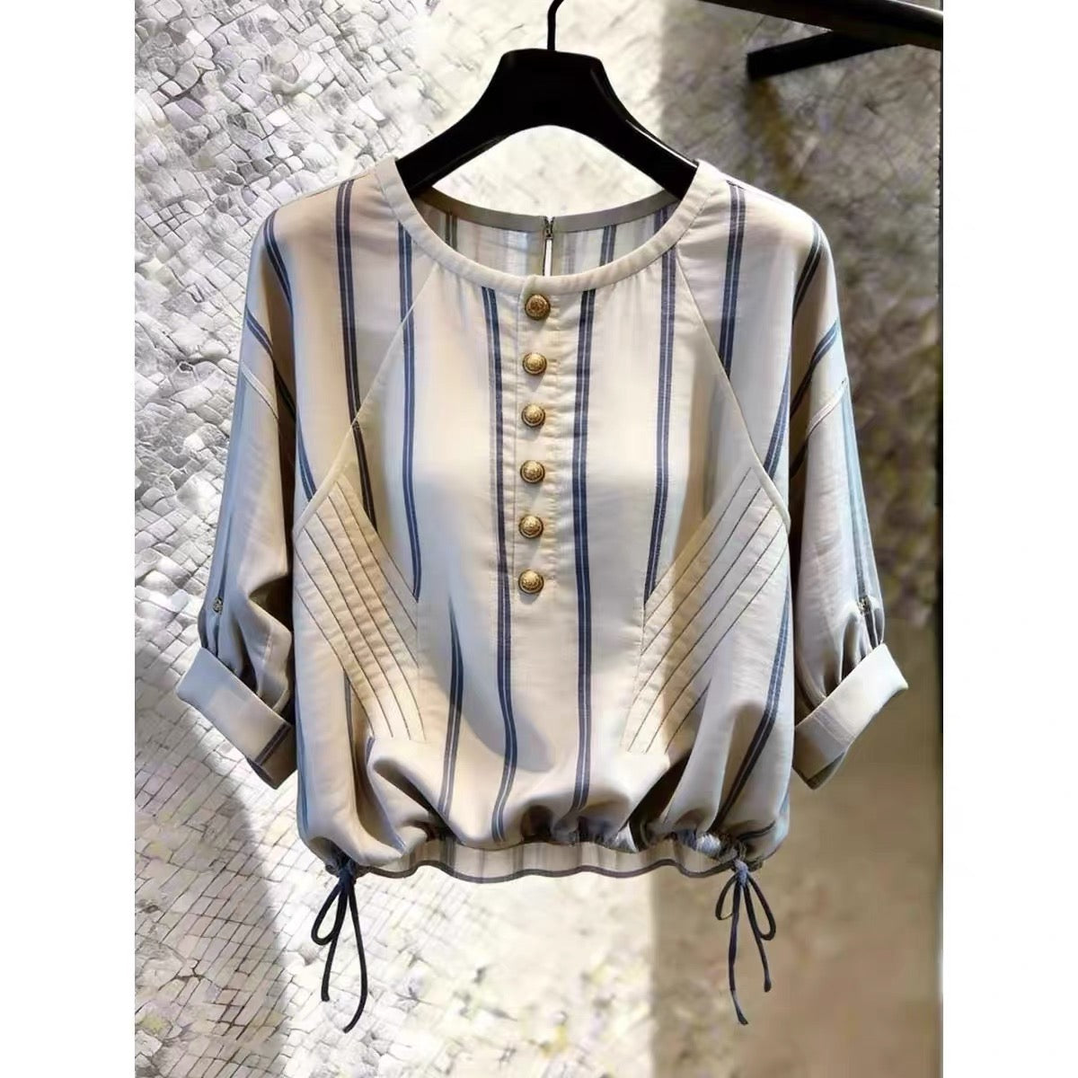 Store-exclusive 2026 Summer New Arrival: Women's French-style striped top featuring a round neck, chic commuter aesthetic, and a drawstring waist.