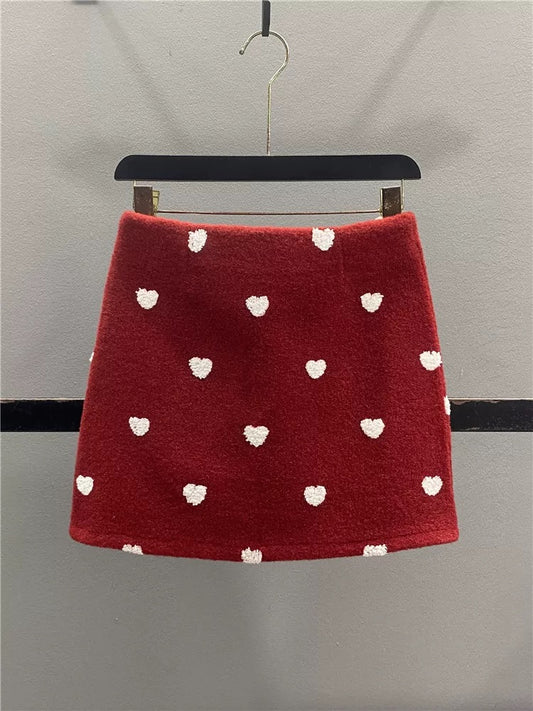 Red heart-patterned wool midi skirt, women's 2025 autumn/winter new Korean style, age-reducing, slimming, versatile A-line bodycon mini skirt.