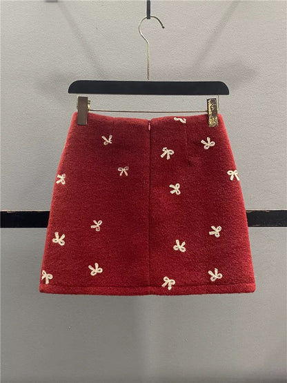 Red embroidered wool midi skirt for women, 2025 autumn/winter new style, anti-exposure, slimming A-line bodycon mini skirt.