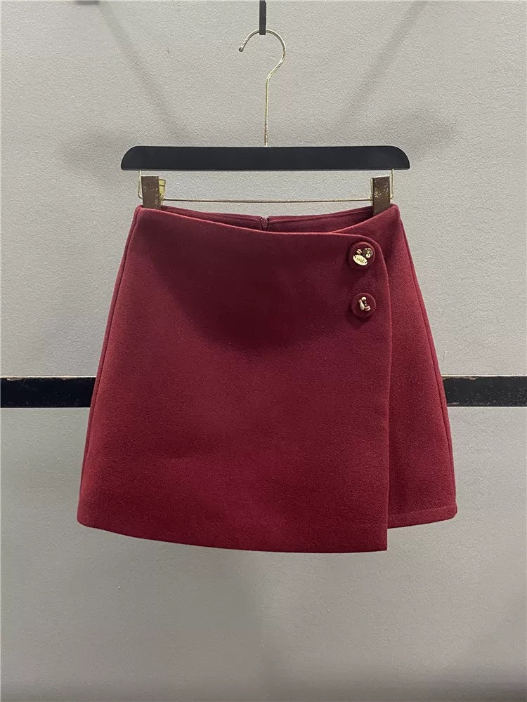 Stylish red irregular wool midi skirt for women, autumn/winter 2025, two-button high-waisted, slimming A-line bodycon mini skirt.
