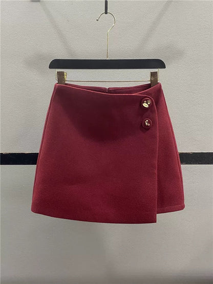 Stylish red irregular wool midi skirt for women, autumn/winter 2025, two-button high-waisted, slimming A-line bodycon mini skirt.