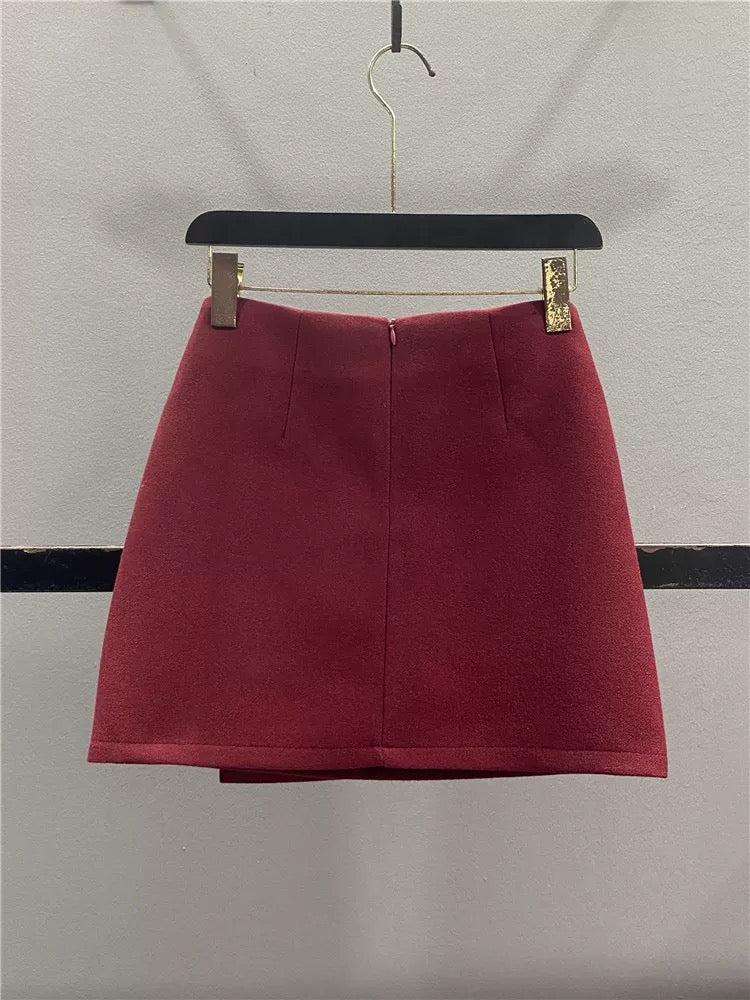 Stylish red irregular wool midi skirt for women, autumn/winter 2025, two-button high-waisted, slimming A-line bodycon mini skirt.
