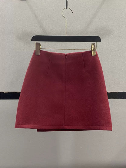 Stylish red irregular wool midi skirt for women, autumn/winter 2025, two-button high-waisted, slimming A-line bodycon mini skirt.