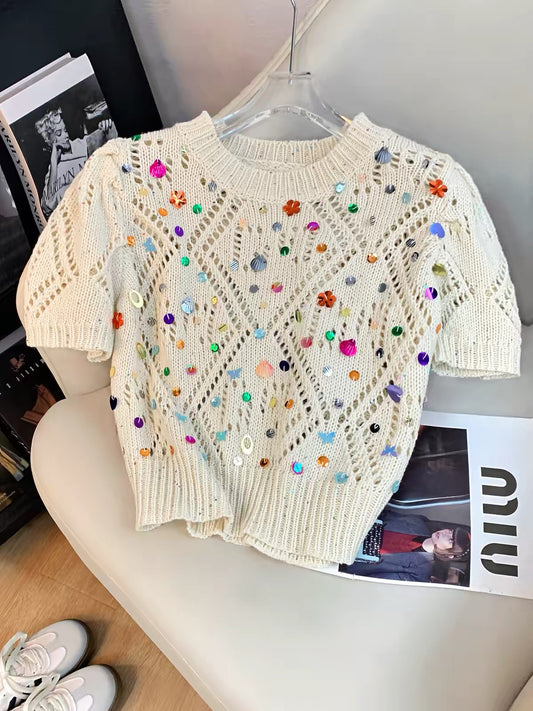 Korean-style "affordable luxury" knit top for women: a soft, relaxed-fit summer tee featuring an openwork round neck and intricate 3D sequin embellishments—perfect for an "Insta-worthy" look.