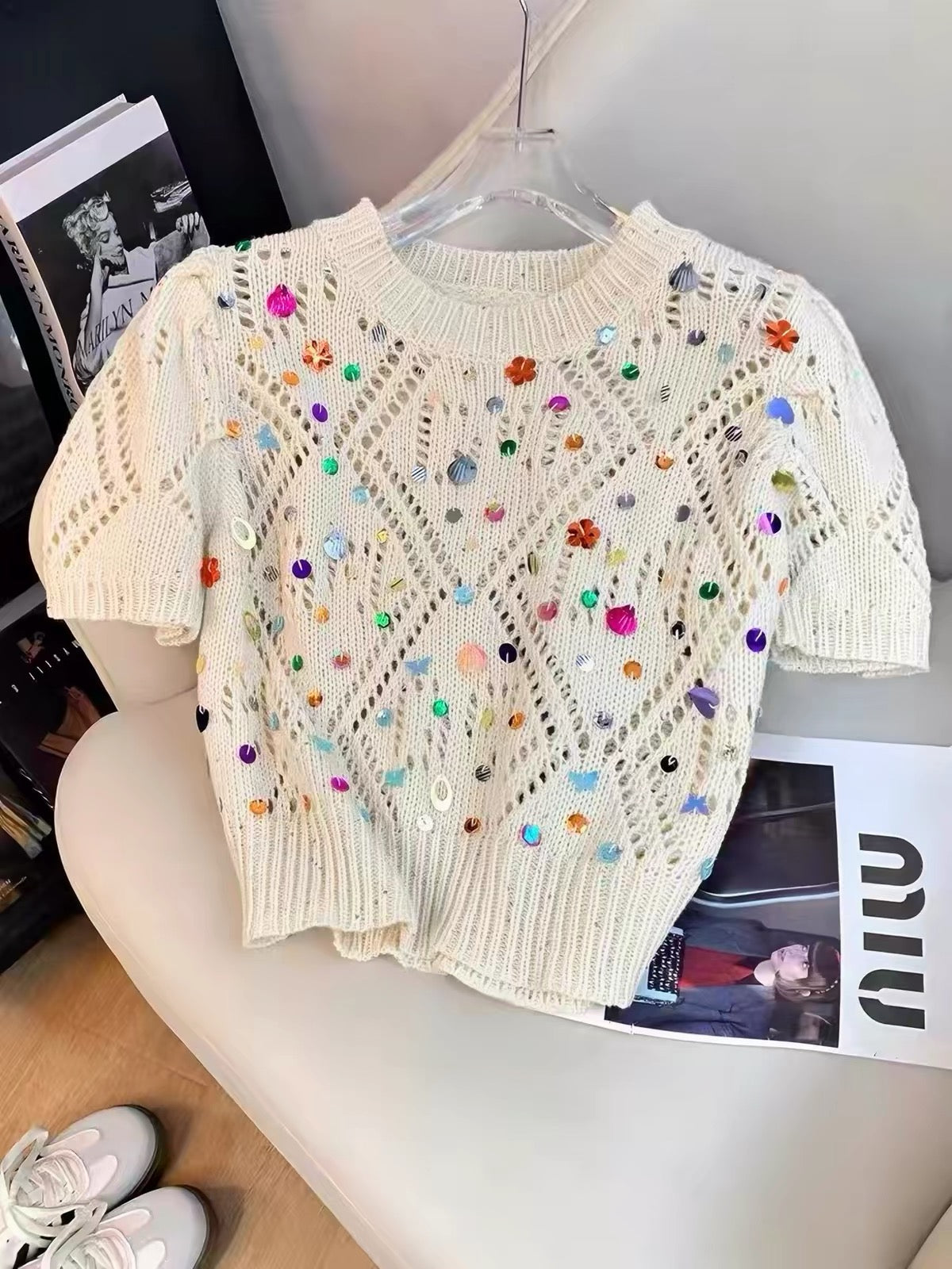 Korean-style "affordable luxury" knit top for women: a soft, relaxed-fit summer tee featuring an openwork round neck and intricate 3D sequin embellishments—perfect for an "Insta-worthy" look.