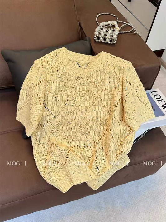 Stylish yellow knit top for women featuring a trendy cut-out design; a chic, loose-fitting, and versatile short-sleeve T-shirt—new for summer.