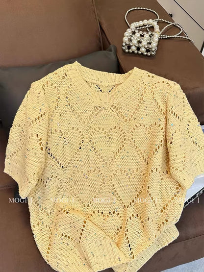 Stylish yellow knit top for women featuring a trendy cut-out design; a chic, loose-fitting, and versatile short-sleeve T-shirt—new for summer.