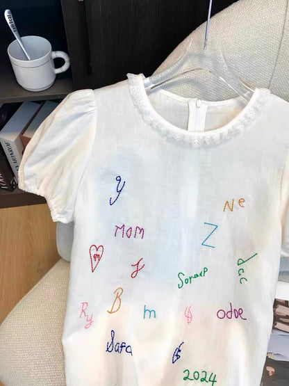 Women's Japanese-style linen-blend short T-shirt featuring playful letter embroidery; a unique, casual, and versatile design that offers a youthful look—perfect for summer.