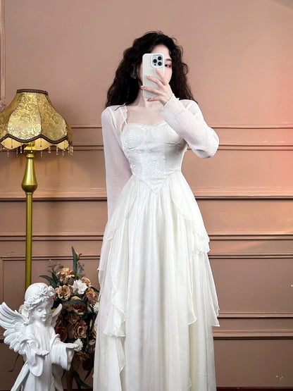 Mrs. Xiao's white French suspender dress for women's pure desire tea break slimming irregular seaside vacation fairy dress summer