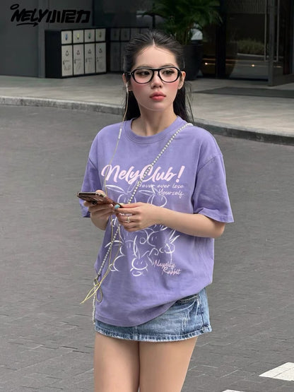 Loose-fit, vintage-style, versatile basic short-sleeve T-shirt featuring a hand-drawn rabbit and letter print and a round neckline.