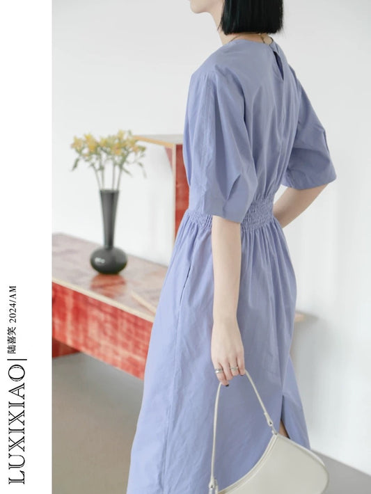 LUXIXIAO dress 2025 new style waist slit design Korean version short-sleeved round neck medium-length A-line skirt