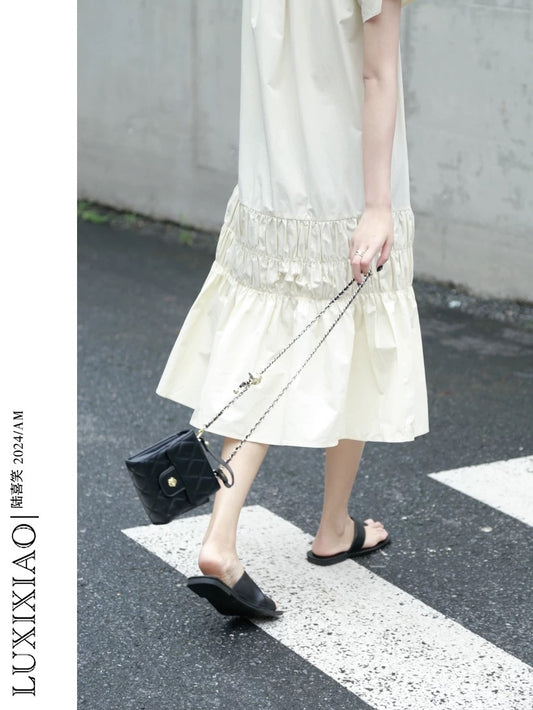 LUXIXIAO dress 2025 new loose slim round neck design pullover Korean version short-sleeved shirt dress female