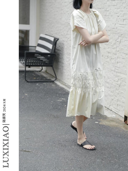 LUXIXIAO dress 2025 new loose slim round neck design pullover Korean version short-sleeved shirt dress female