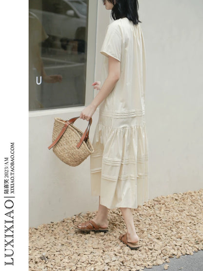 LUXIXIAO dress 2025 new loose shoulder sleeve pleated design Korean version of the round neck shirt dress