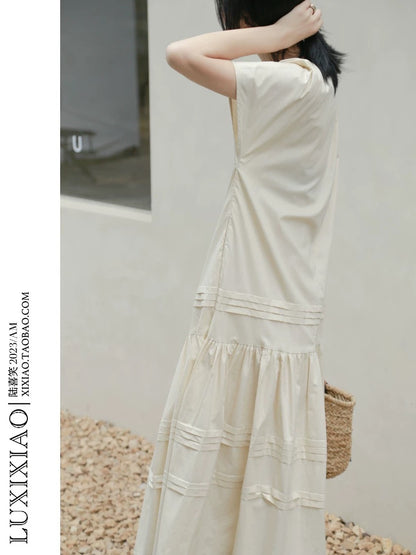 LUXIXIAO dress 2025 new loose shoulder sleeve pleated design Korean version of the round neck shirt dress
