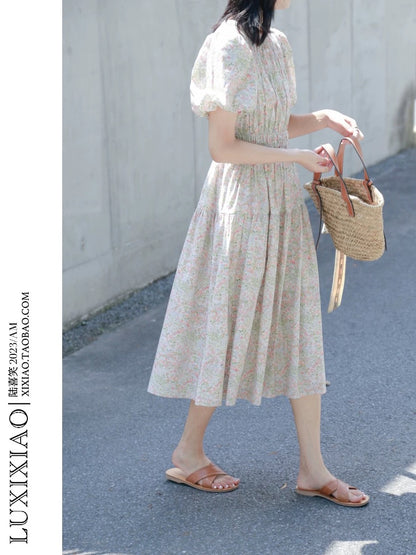 LUXIXIAO dress 2025 new loose round neck high waist puff sleeve pullover Korean version A-line floral dress female