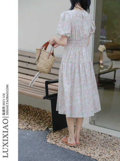 LUXIXIAO dress 2025 new loose round neck high waist puff sleeve pullover Korean version A-line floral dress female