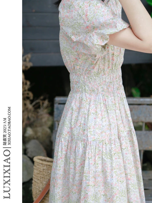 LUXIXIAO dress 2025 new loose round neck high waist puff sleeve pullover Korean version A-line floral dress female