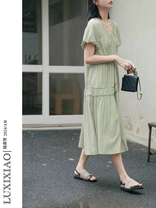 LUXIXIAO dress 2025 new loose puff sleeves V-neck design long skirt Korean version A-line skirt female summer