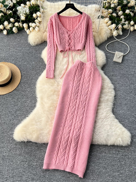New autumn and winter design sense hollow strap short belly-exposed knitted top + ultra-high waist cable sweater skirt